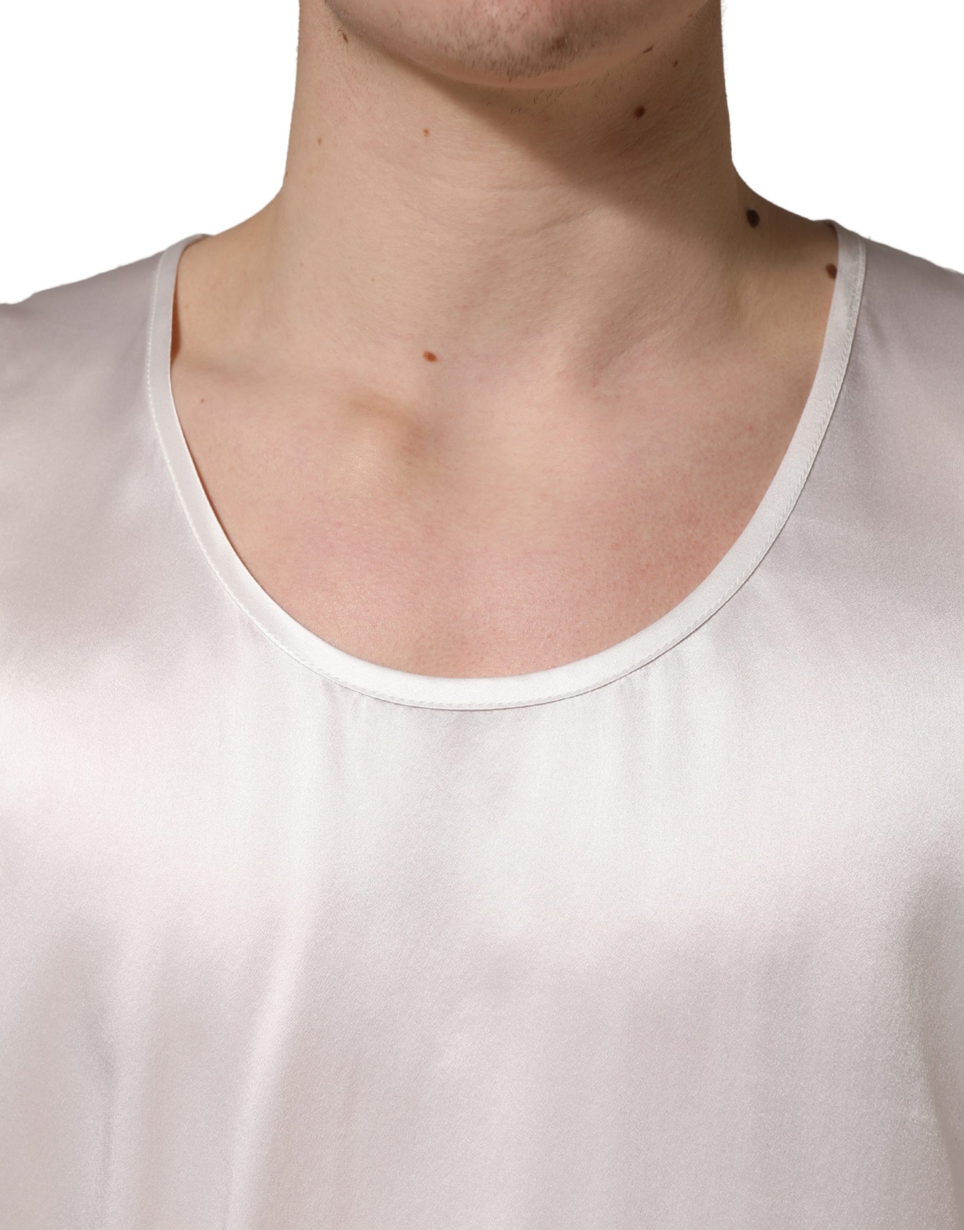 Man wearing white tank top