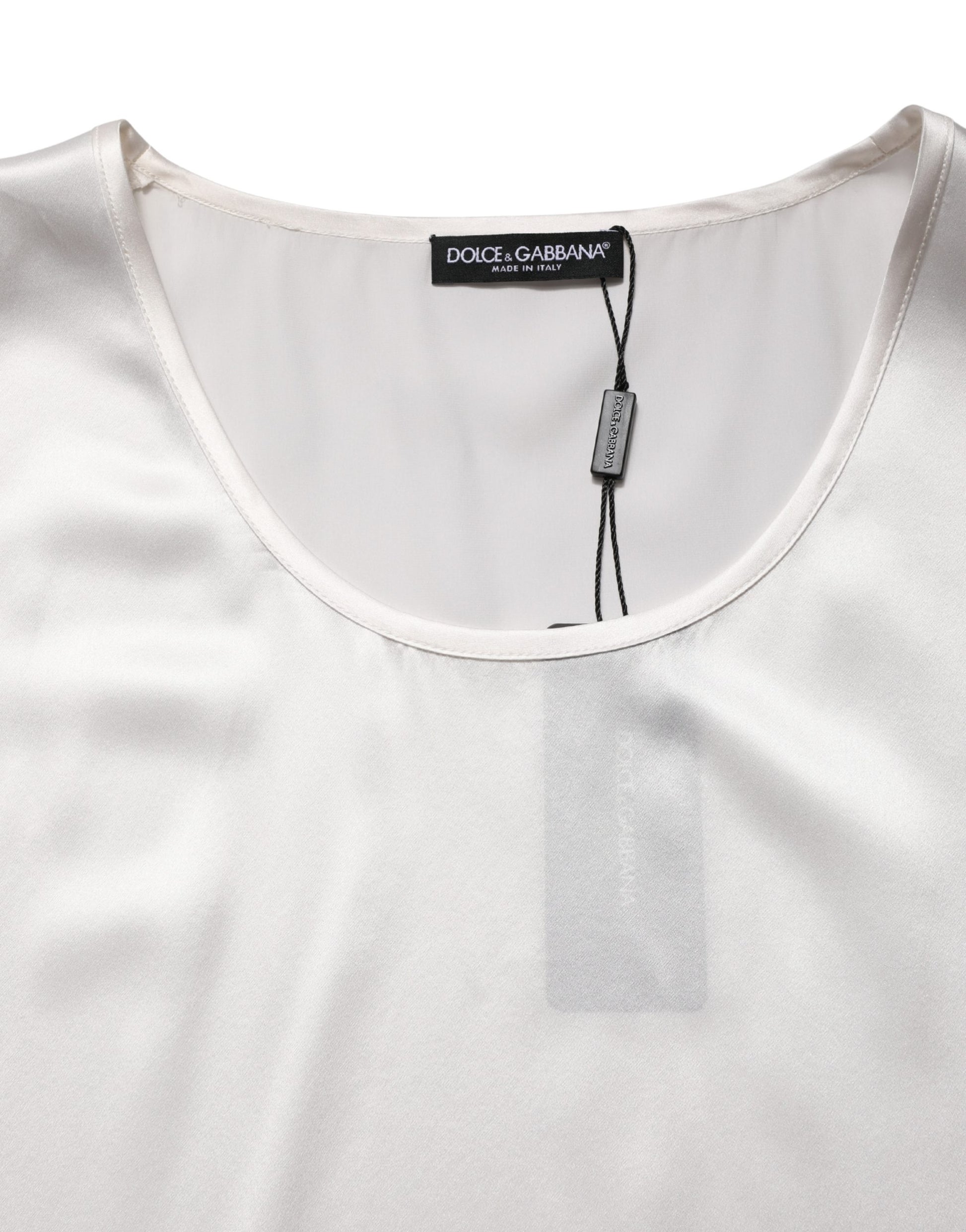 White tank top with black tag on neckline