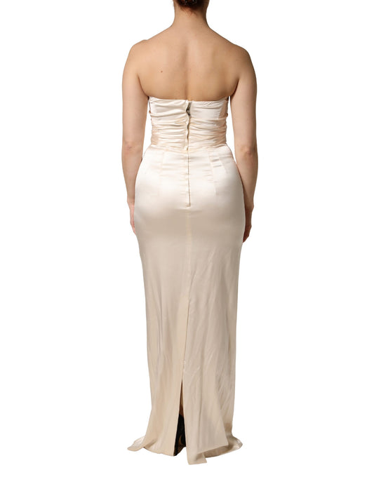 A white satin strapless sheath maxi dress from Dolce & Gabbana