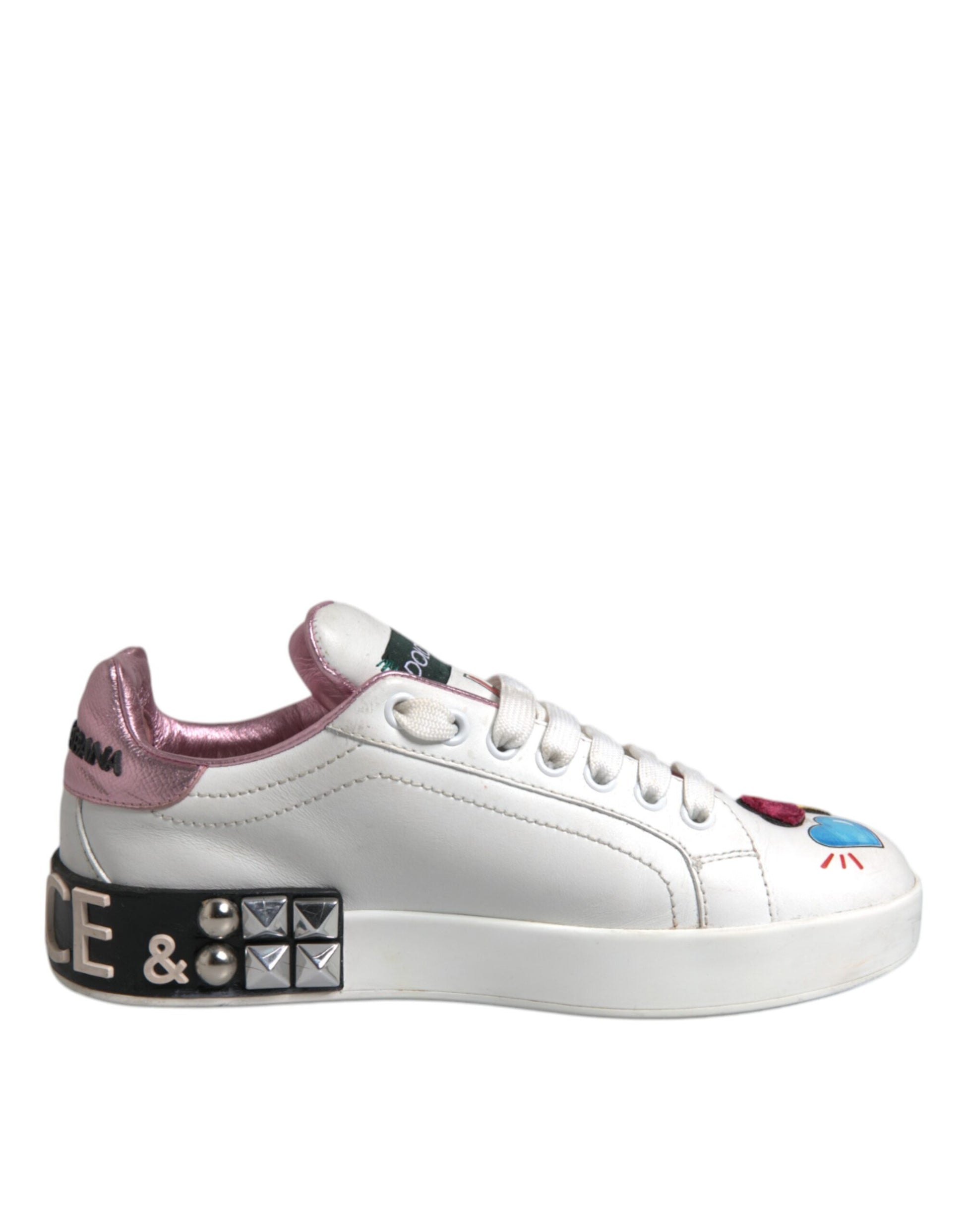 Pink and white sneakers with floral pattern on side