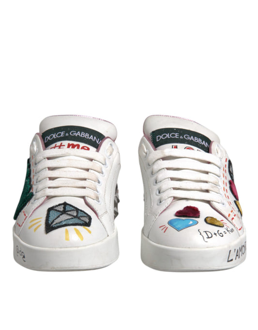 Pair of white sneakers with colorful designs on sides