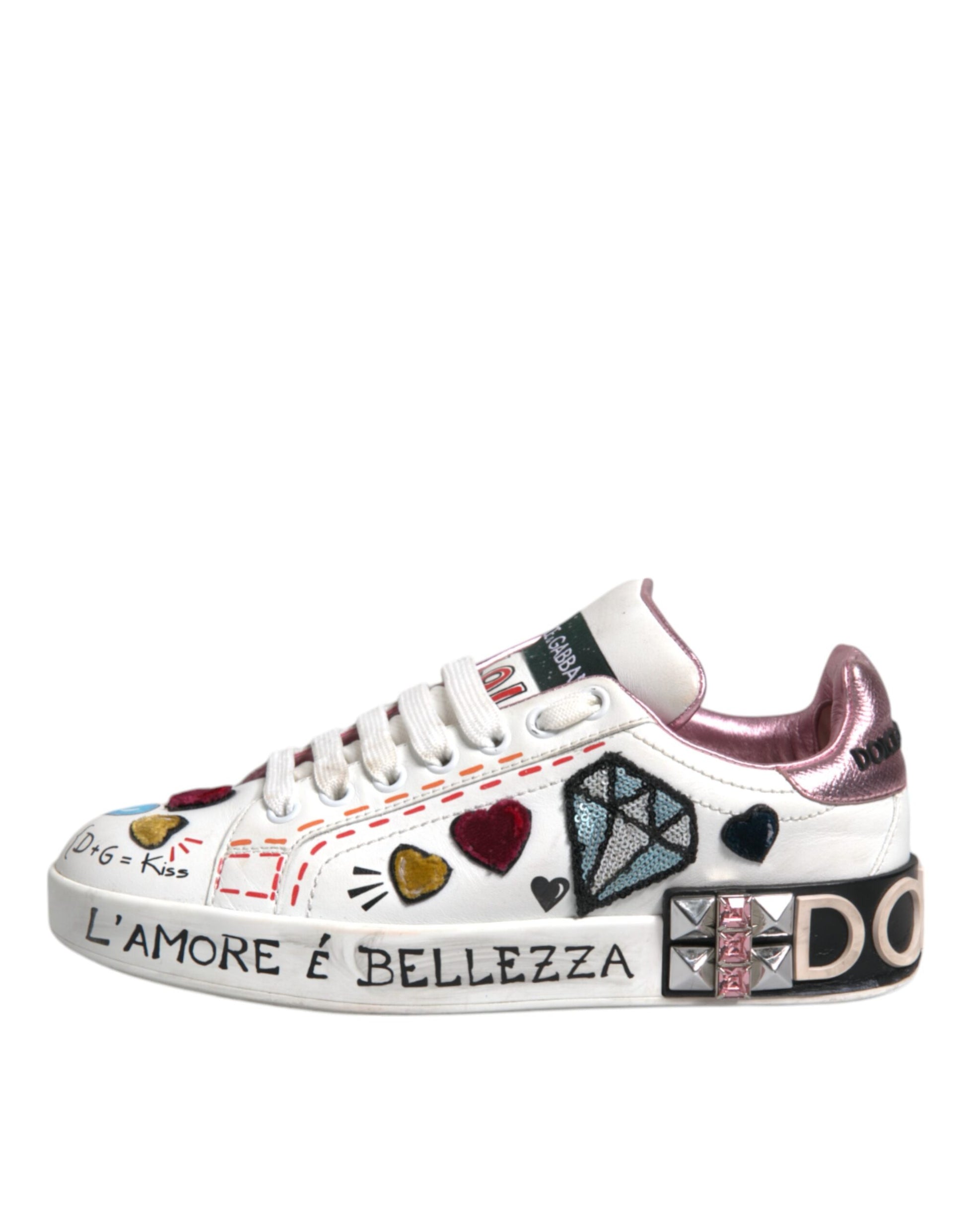 White sneaker with colorful hearts and writing on side