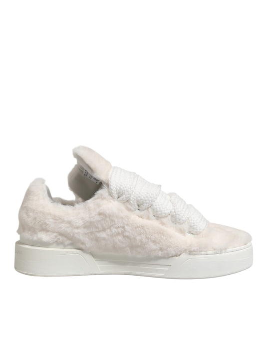 Soft pink suede sneaker with white laces