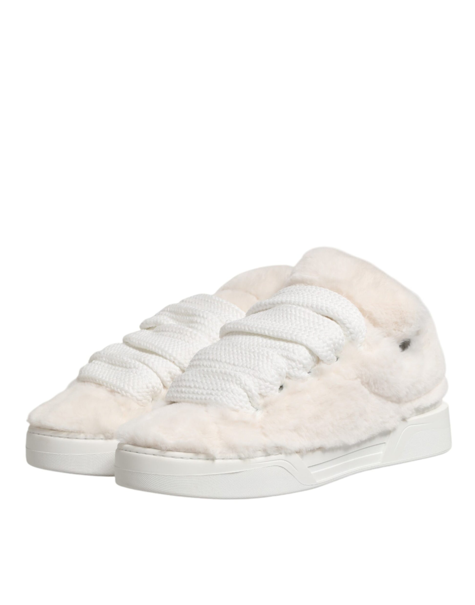 Pair of furry slippers with white soles