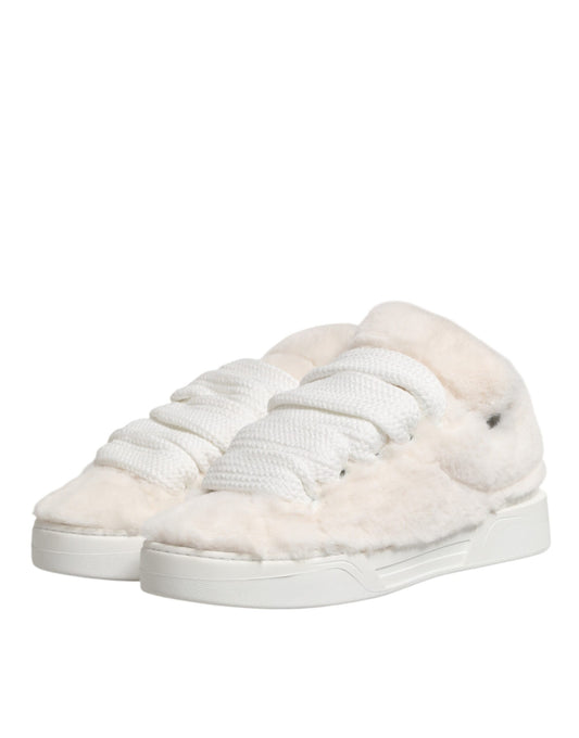 Pair of furry slippers with white soles