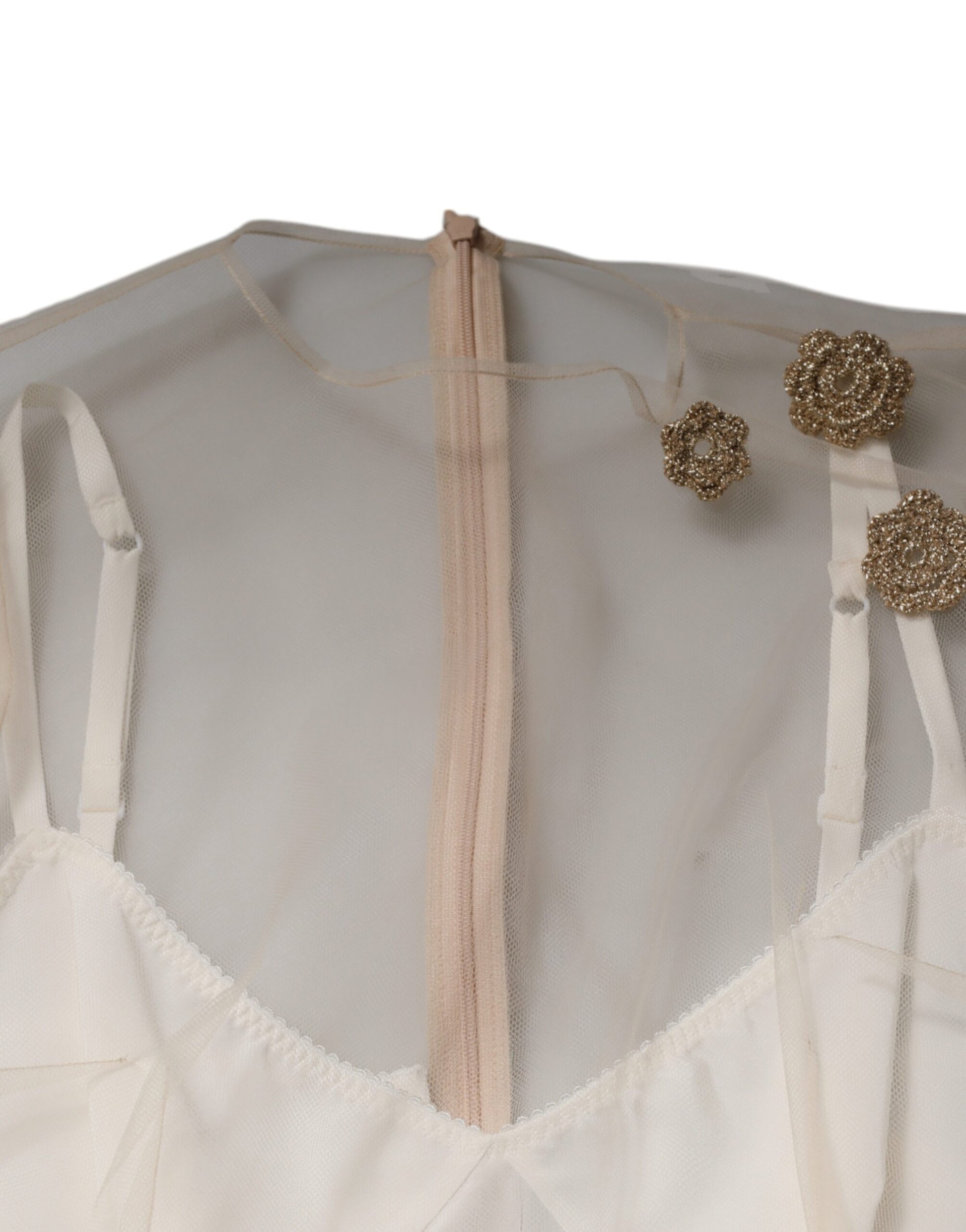 A white sheer tulle bustier bodycon midi dress with a beige lining and gold embellishments