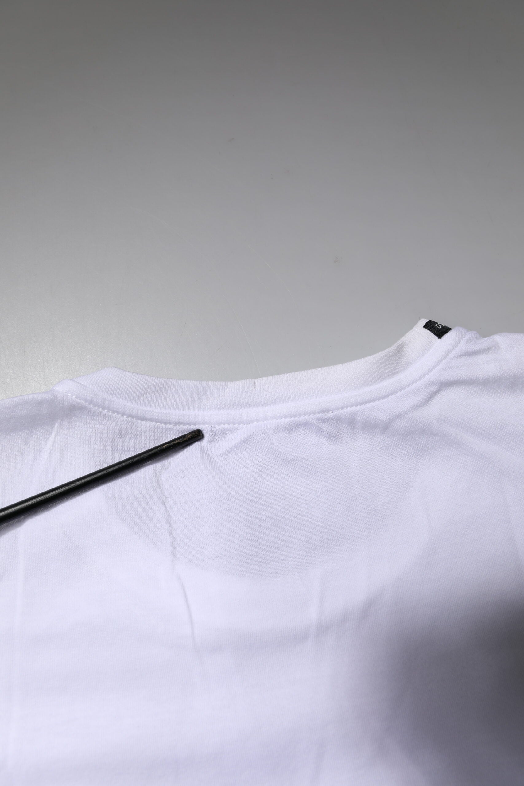 White t-shirt on table
