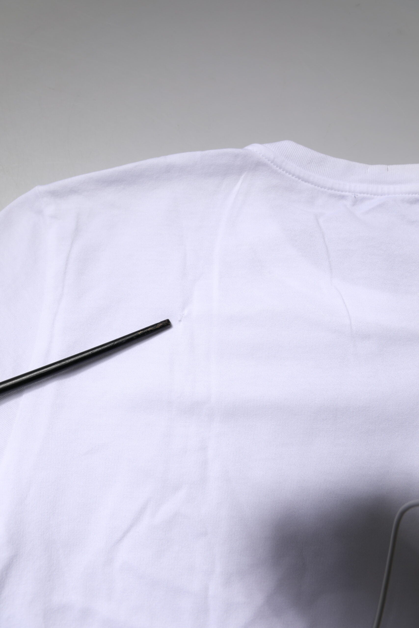 White t-shirt on table