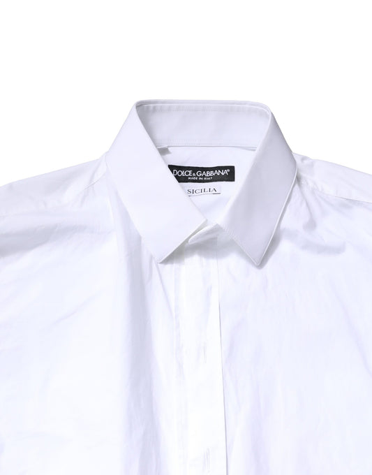 A white cotton dress shirt with a collar and buttons, from the brand Dolce & Gabbana