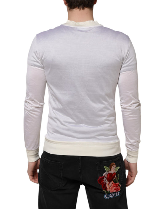 Man wearing long sleeve shirt and jeans
