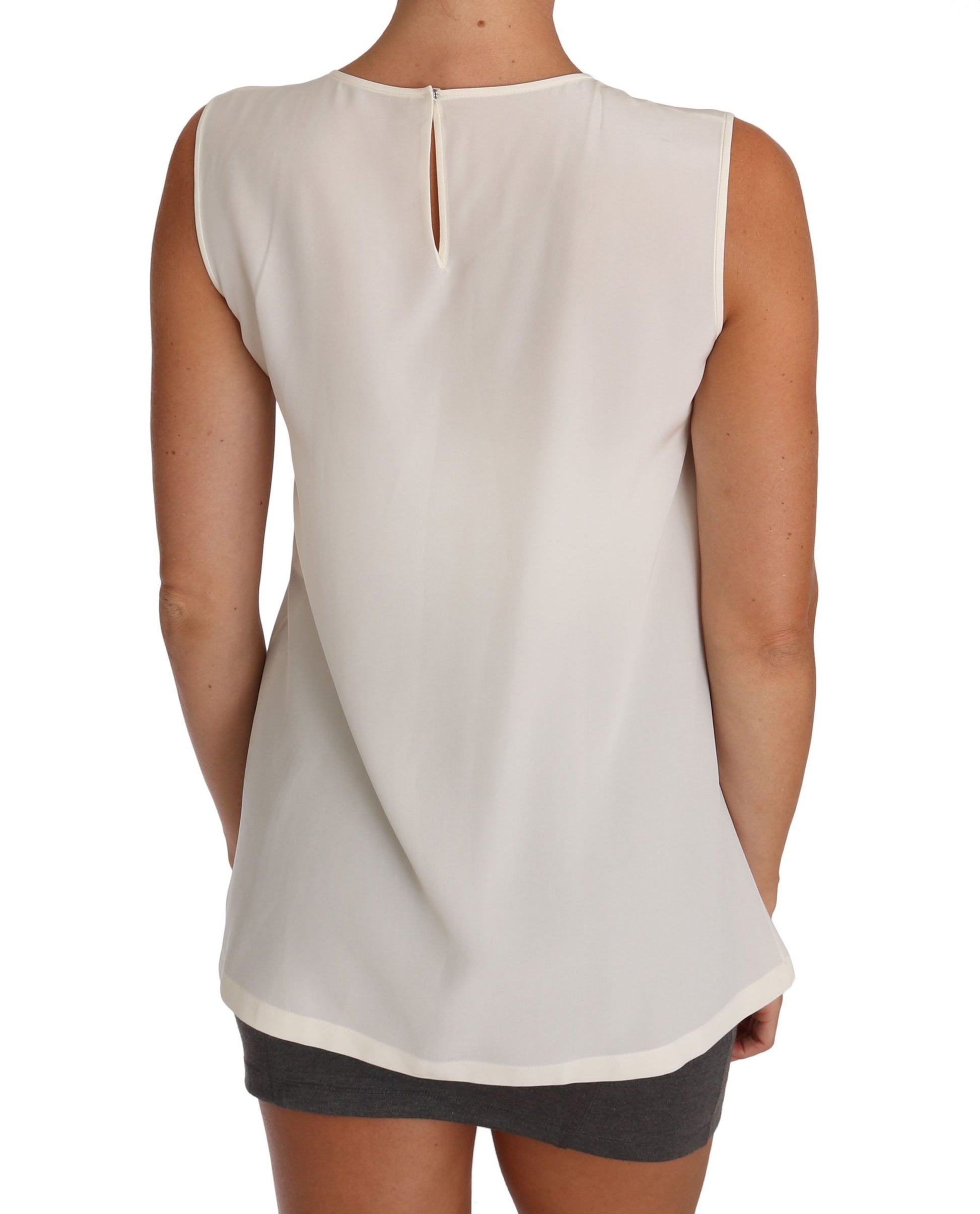 White sleeveless top with scoop neckline