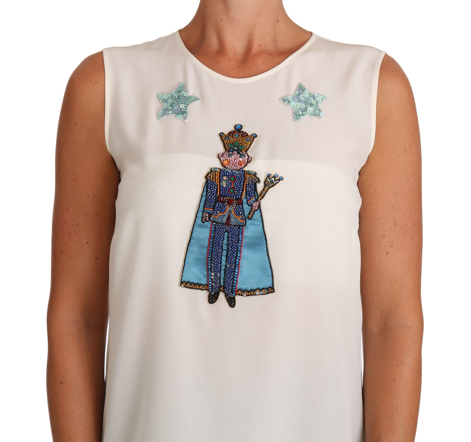 White blouse with embroidered royalty figure