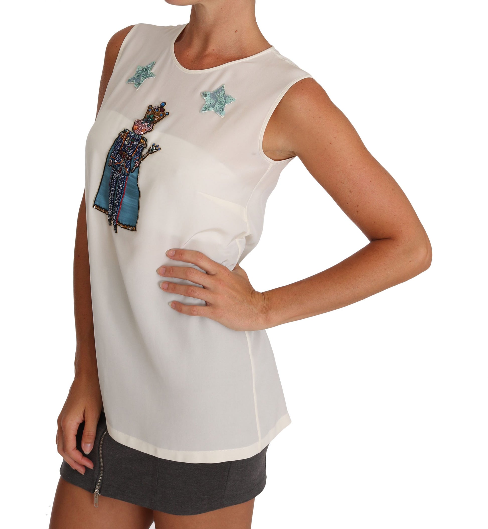 White sleeveless top with star embroidery on front