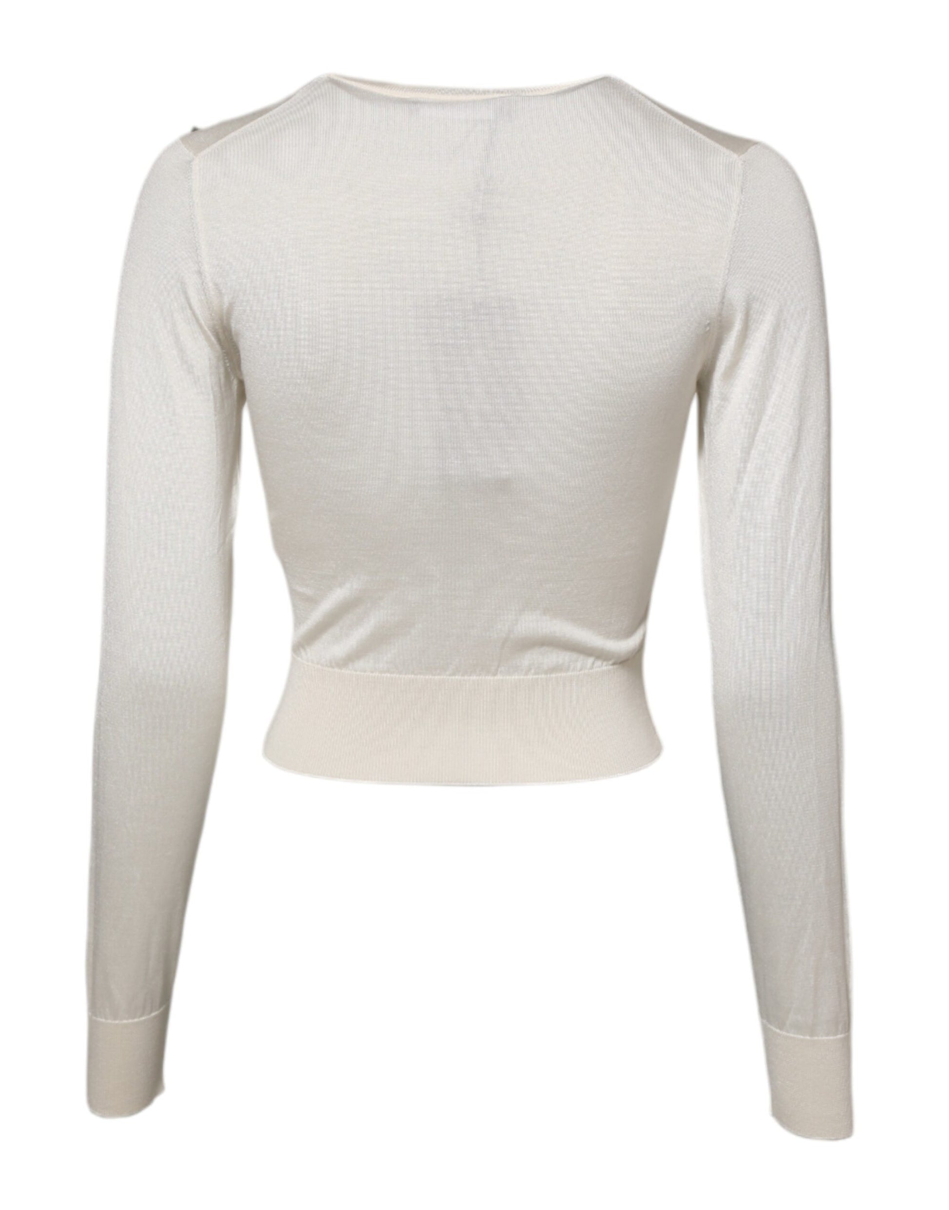 Long sleeve top with high neckline and fitted waistband