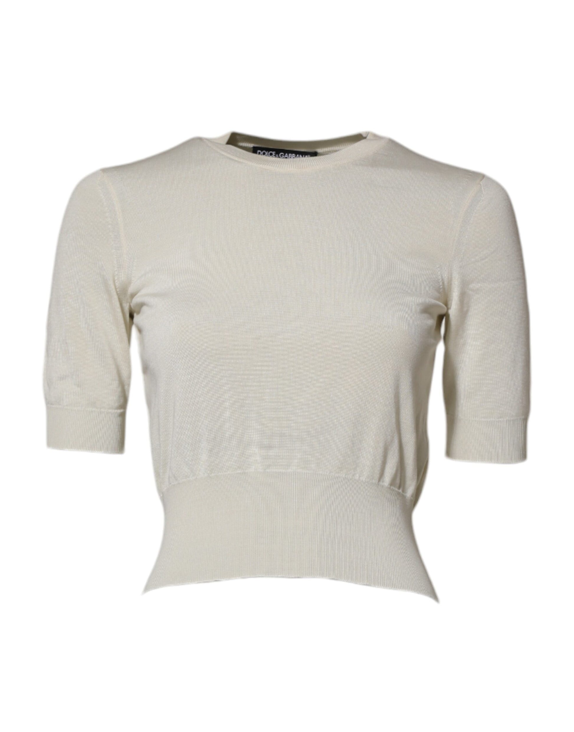 Tan knit sweater on mannequin