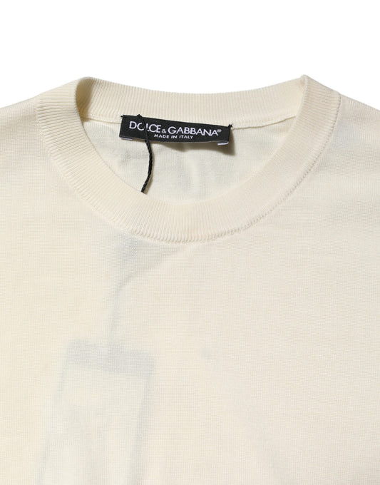 Tan sweater on hanger