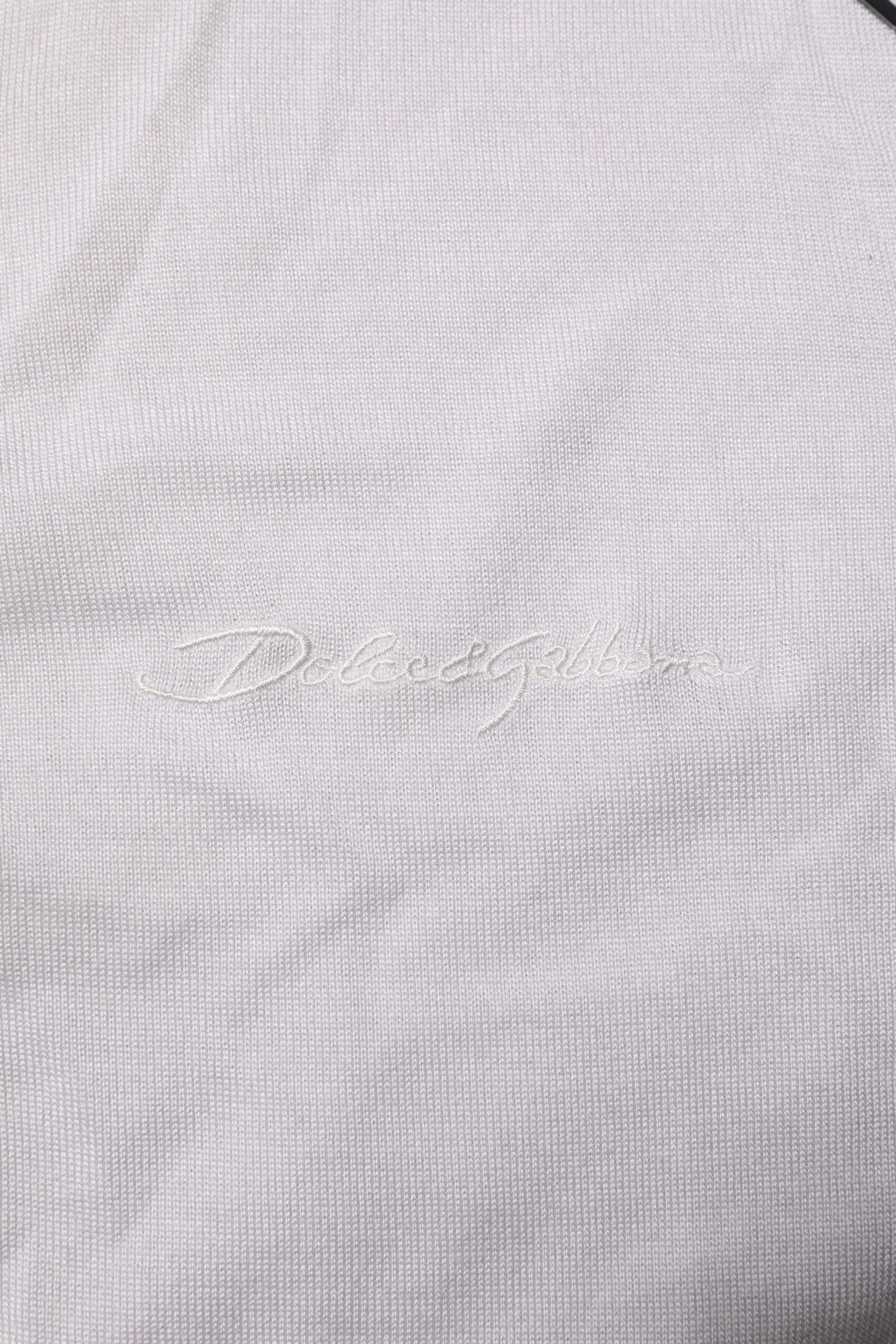 White cloth napkin with embroidered logo