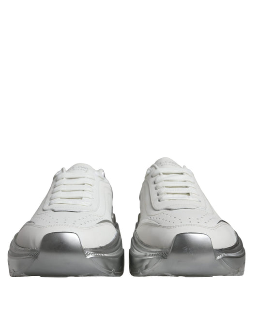 Pair of white sneakers with silver accents