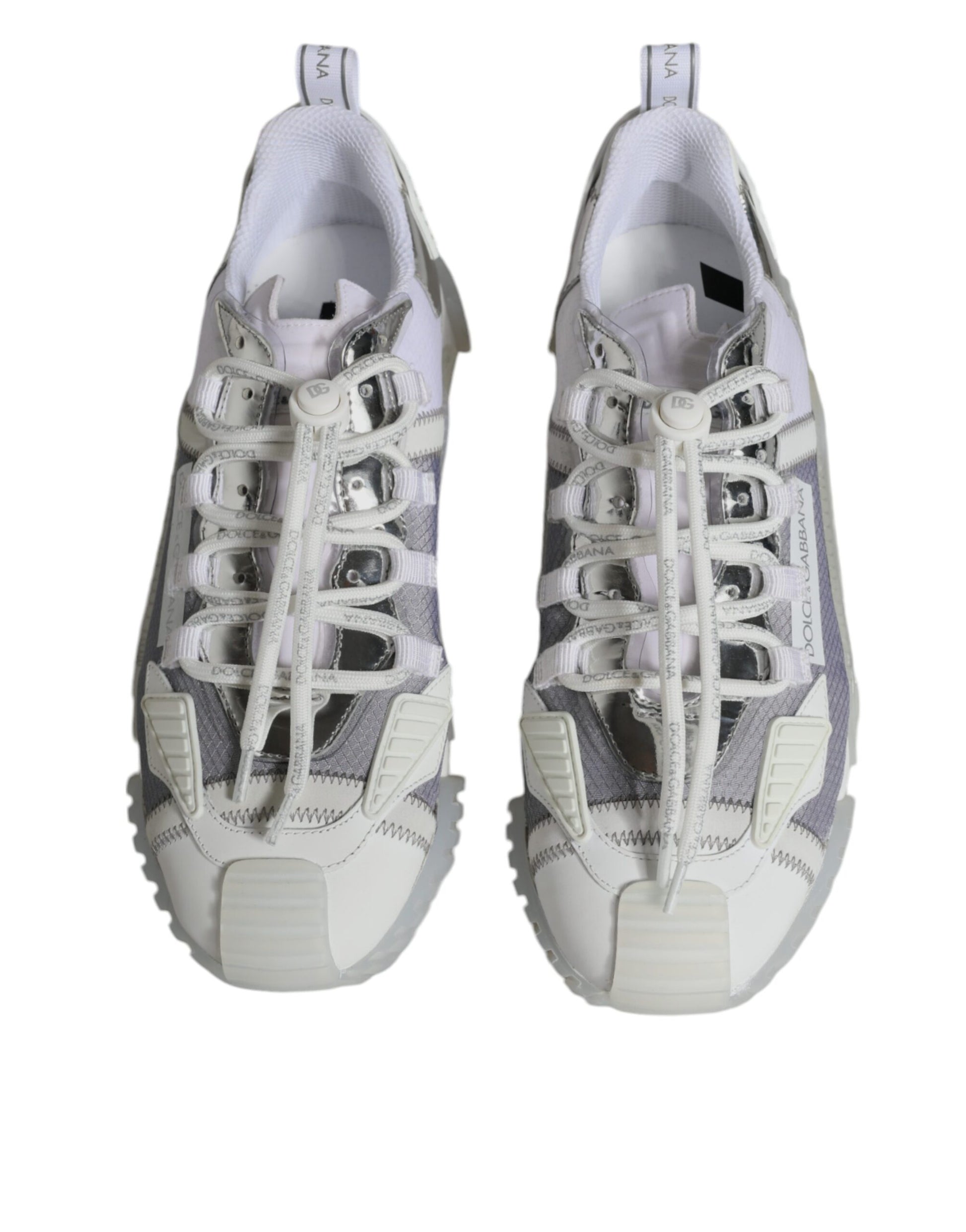 Pair of white and gray athletic shoes with laces