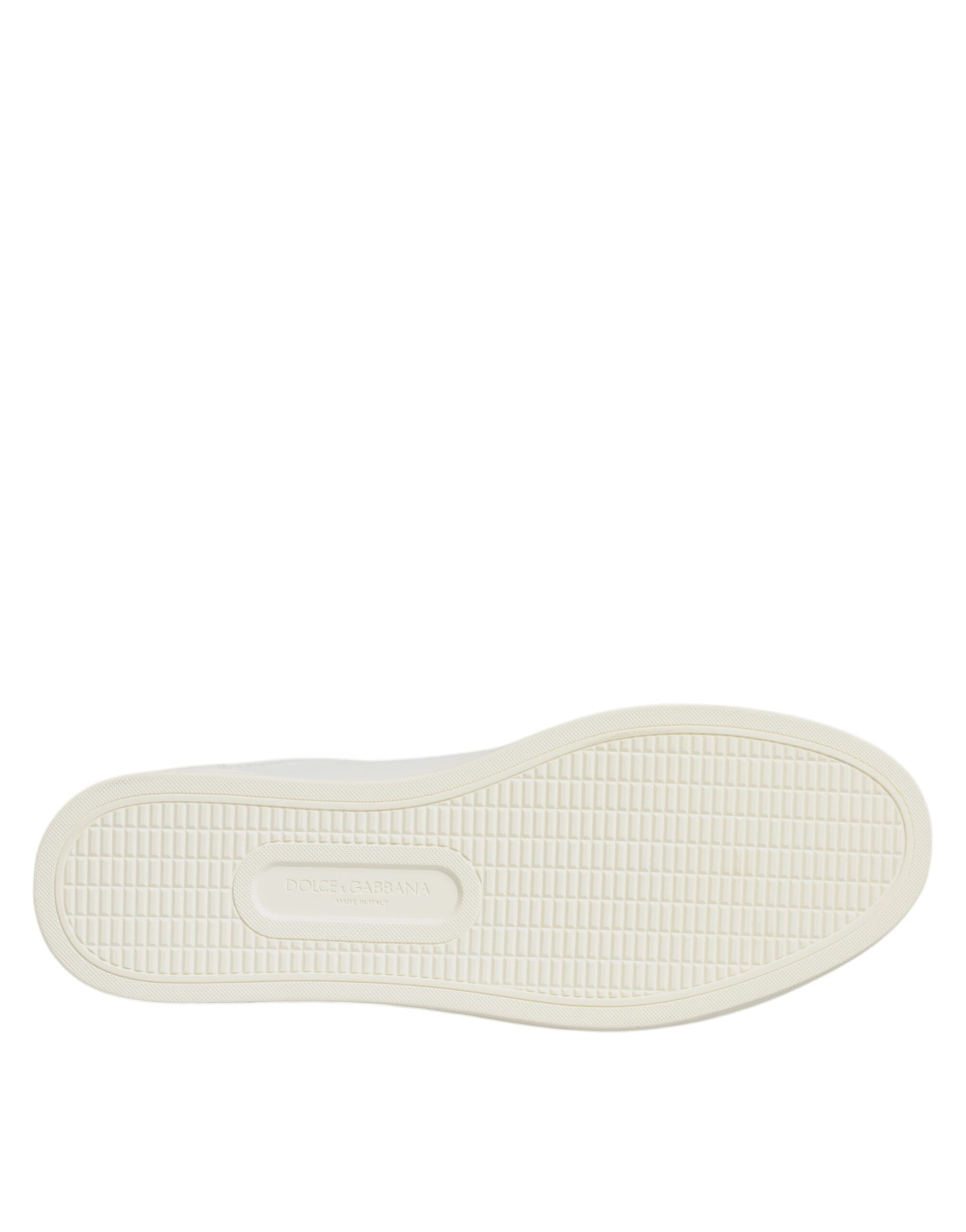 A single white sneaker with a silver heart logo on the side, designed by Dolce & Gabbana
