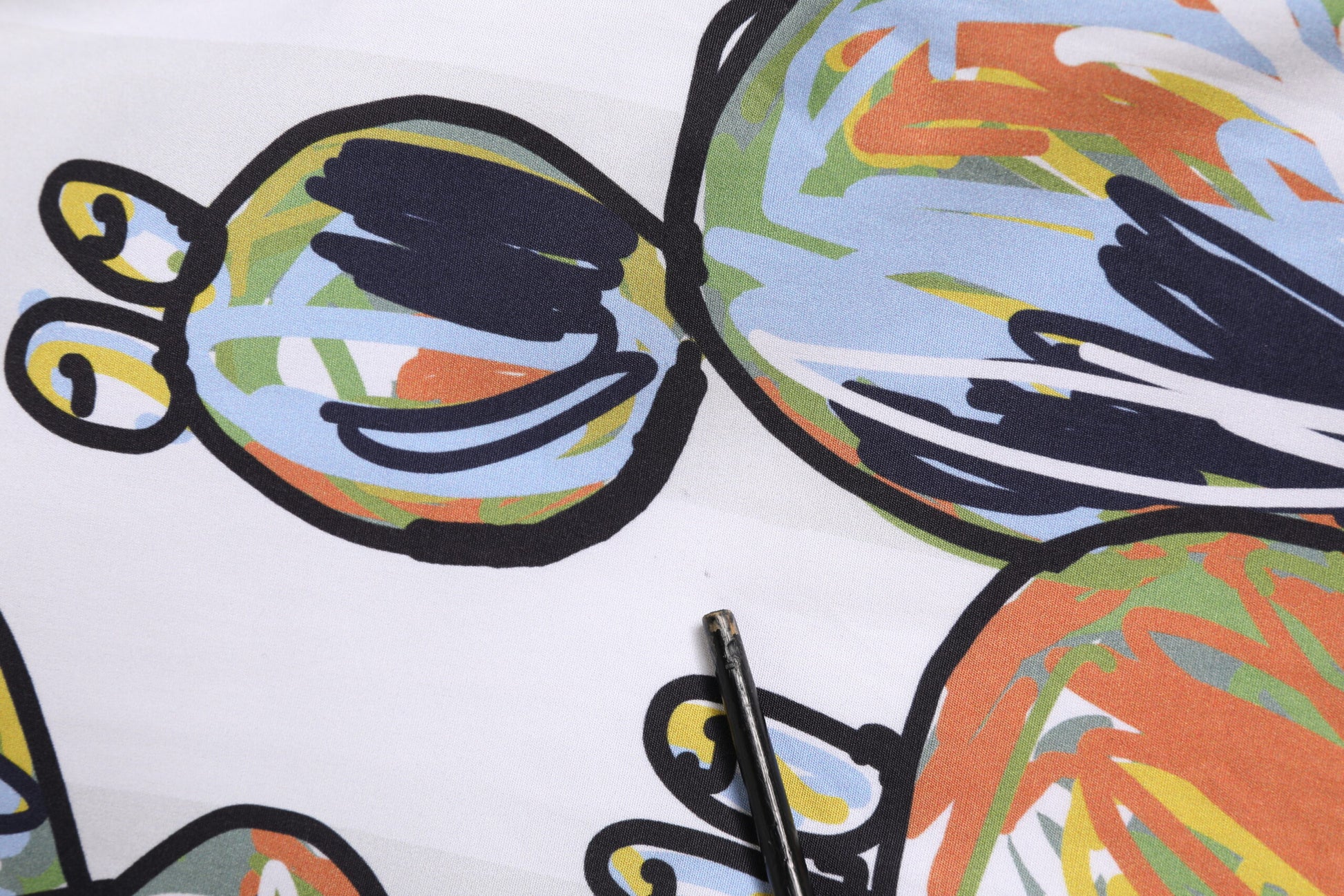 Colorful patterned fabric with a variety of shapes and colors