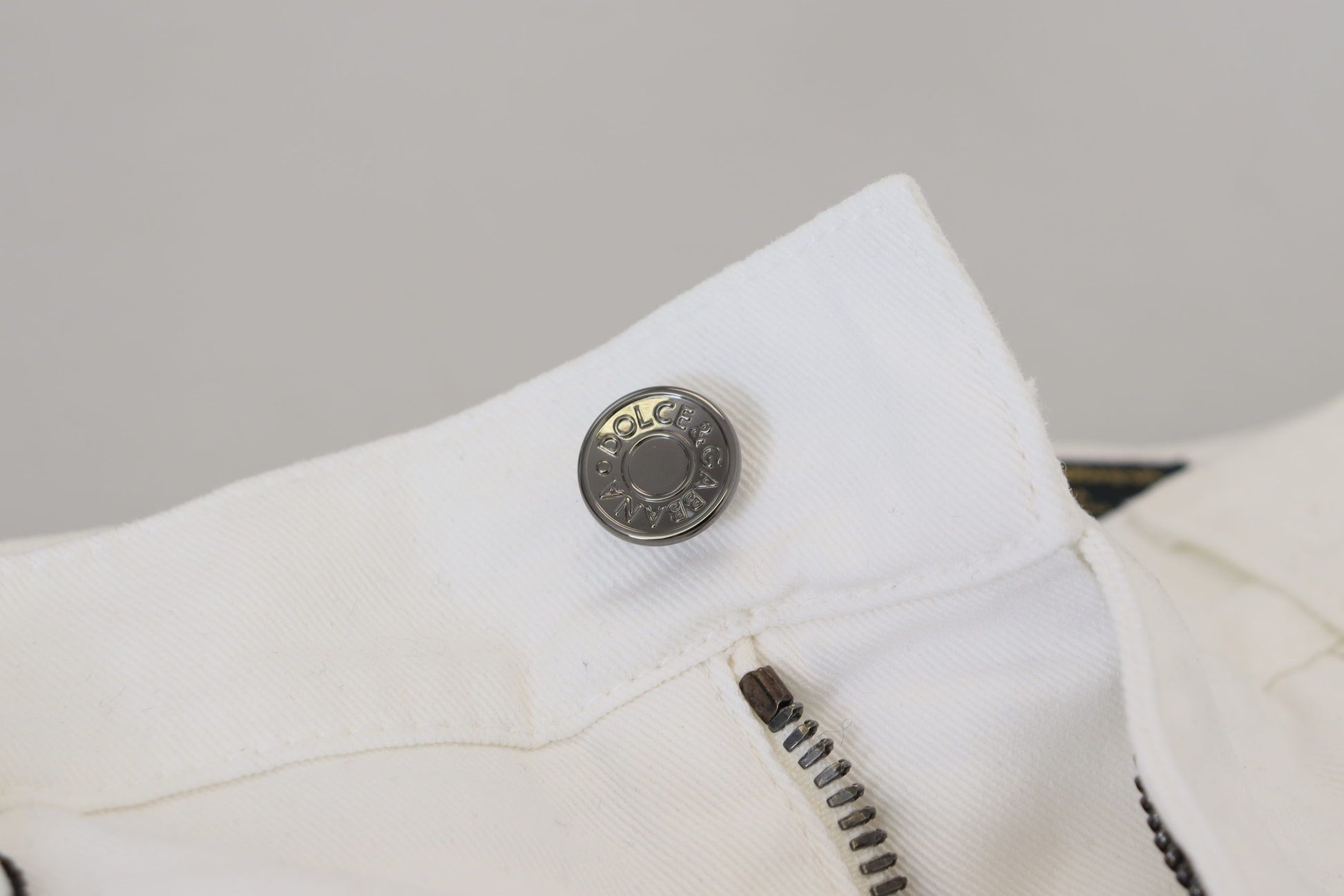 White shirt with gold button