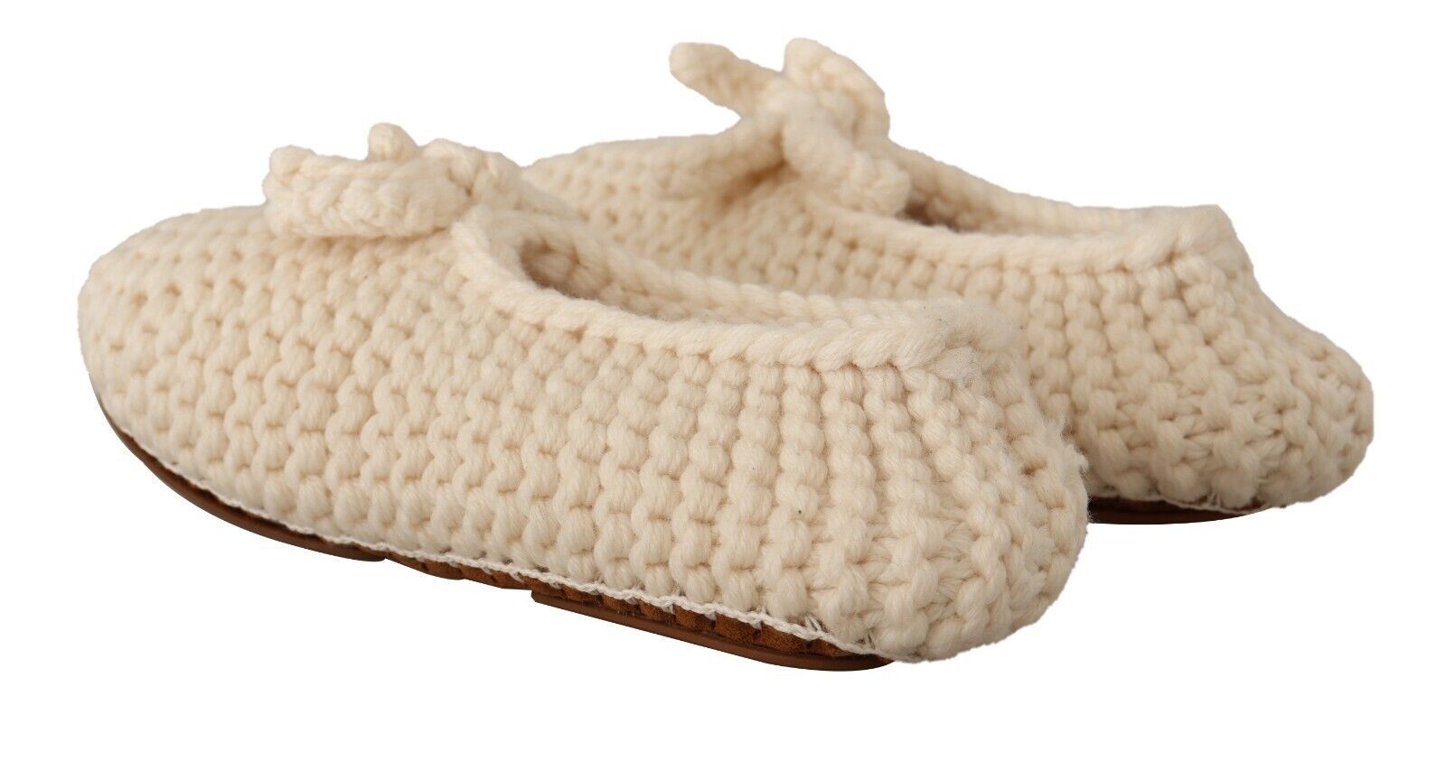 Knitted baby shoes with lace trim and soles