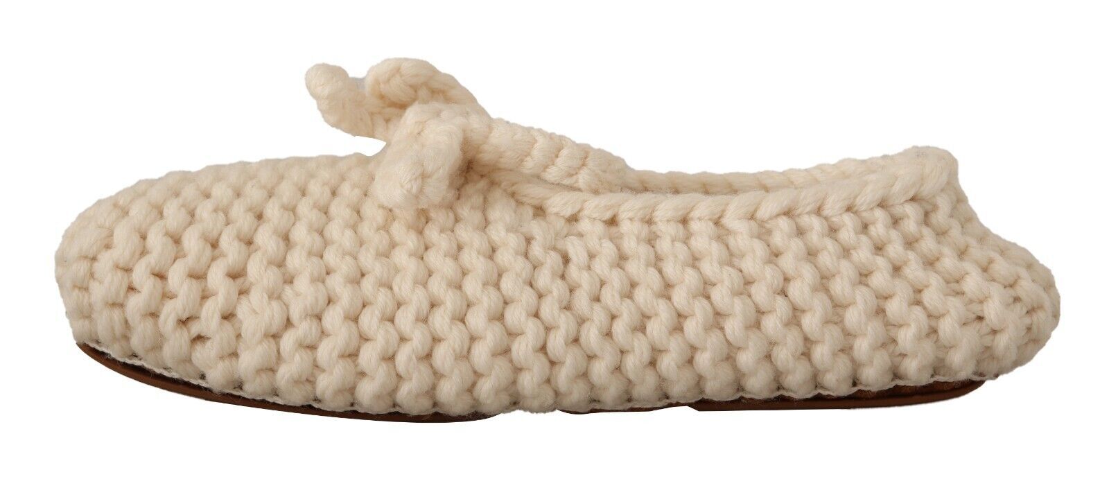 Crocheted slipper shoe with a scalloped edge and a bow on top