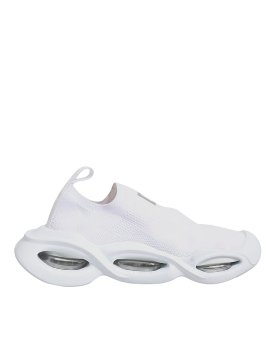White sneakers with three wheels on each foot