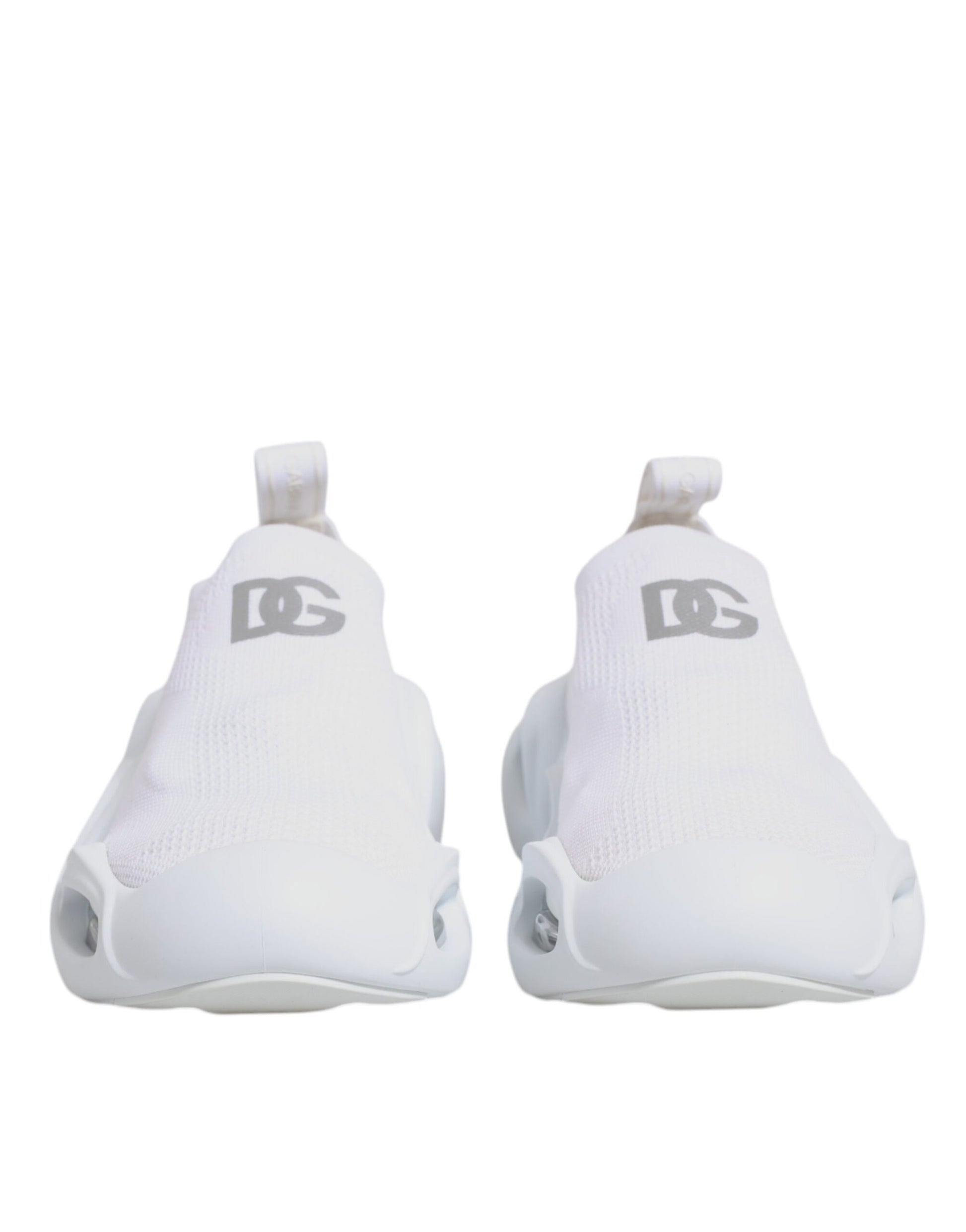 Pair of white sneakers with black laces