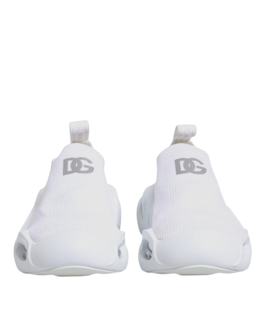 Pair of white sneakers with black laces