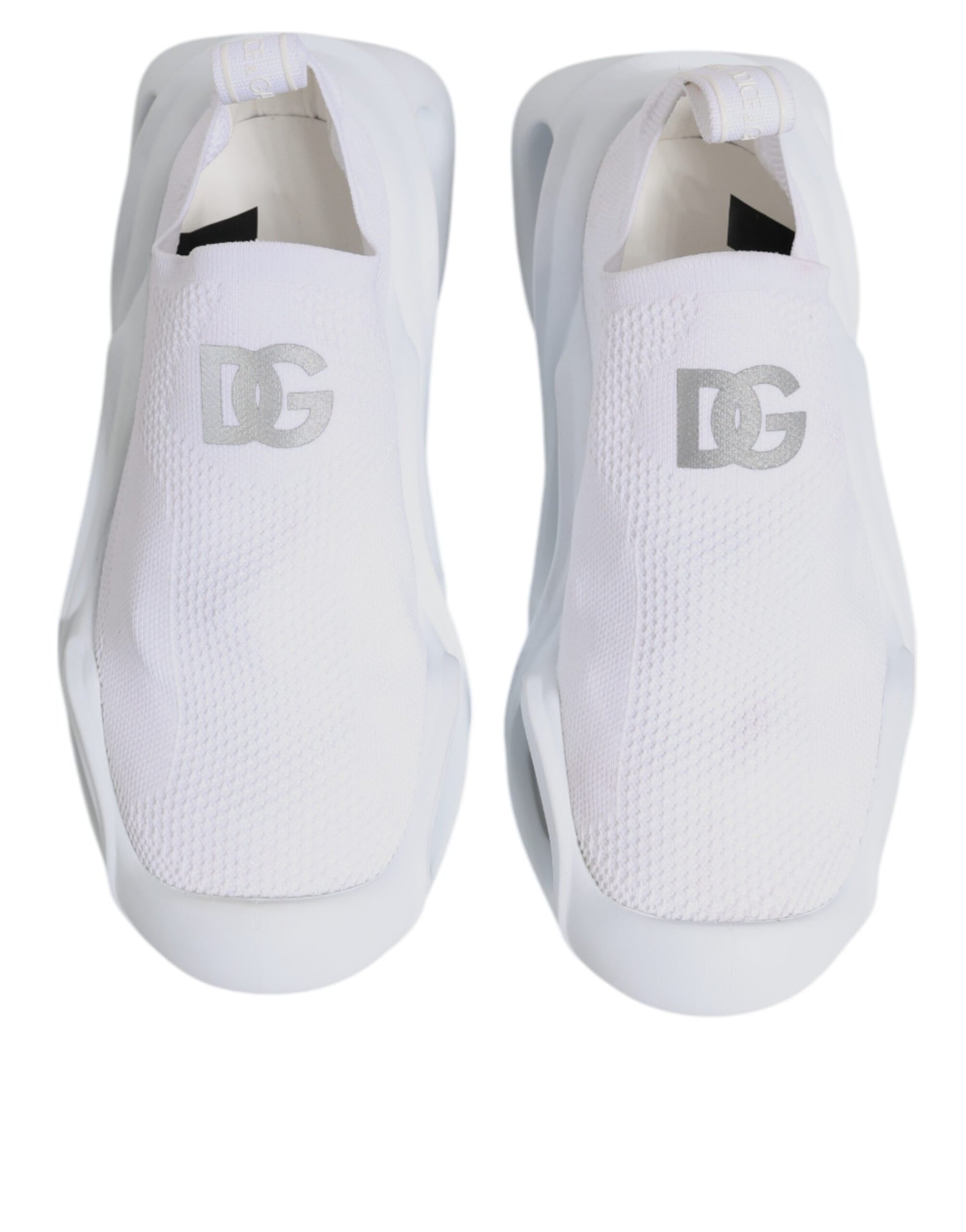 Pair of white sneakers with black logo on side