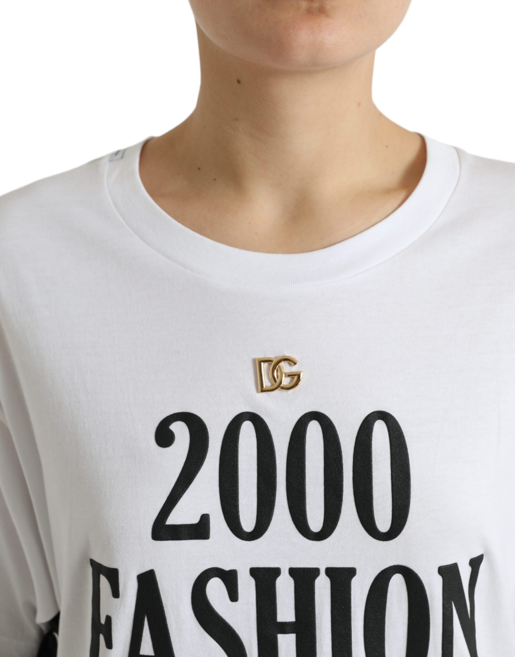 White t-shirt with black lettering reading "2000 fashion show"