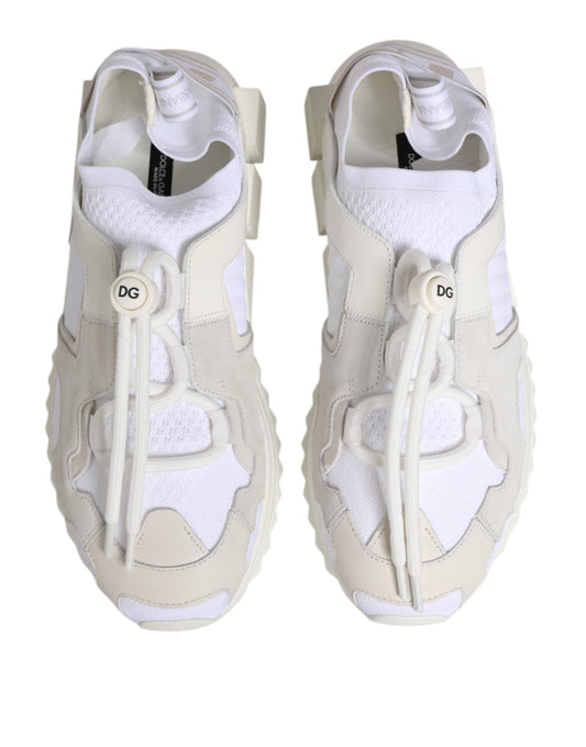 Pair of white lace-up sneakers with a low top and a logo on the side
