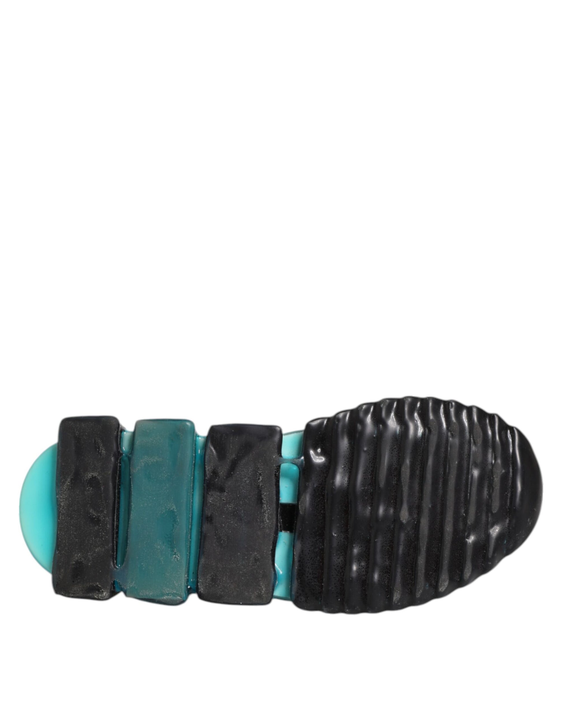 A pair of black slip-on shoes with blue and teal accents