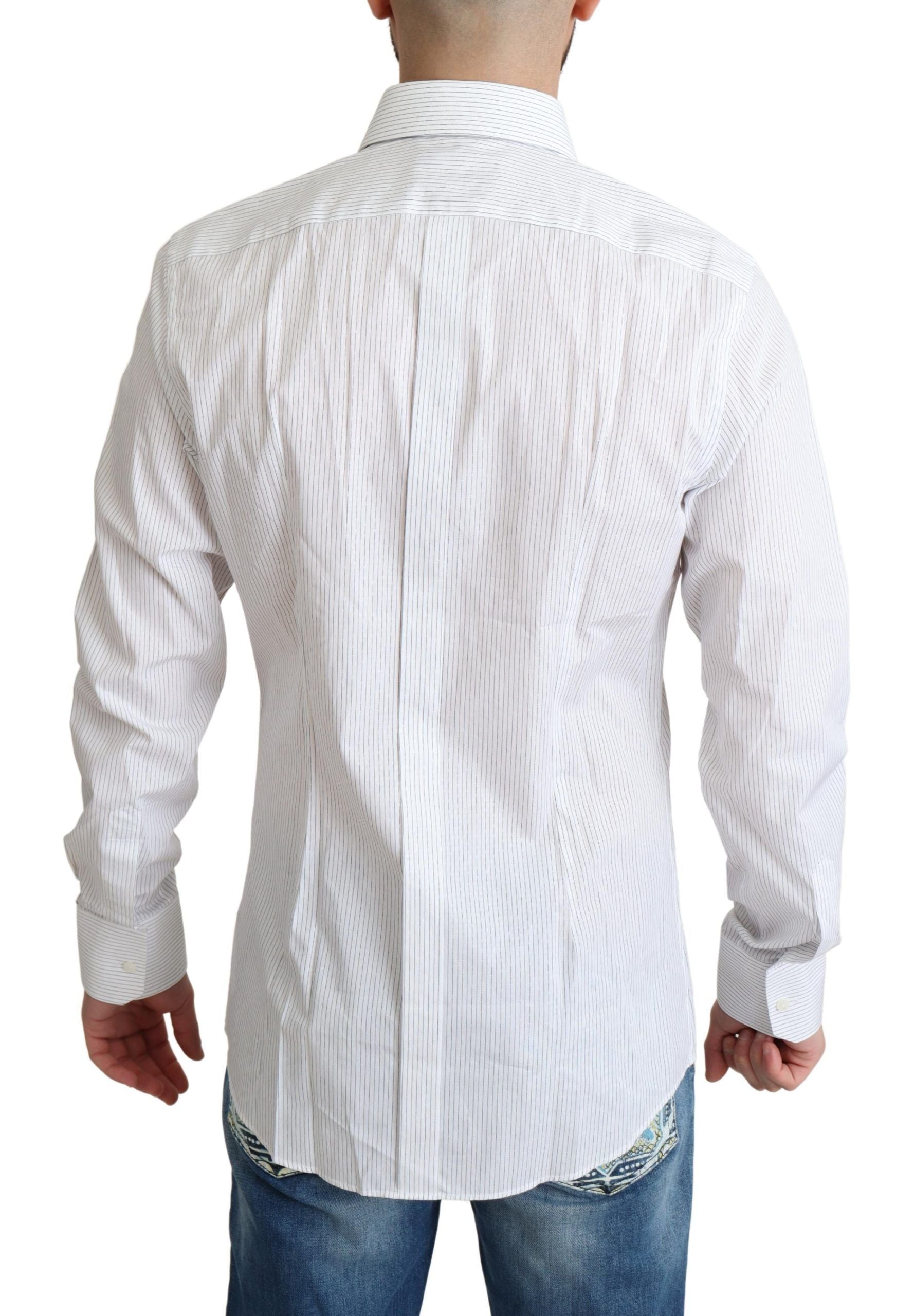 A white cotton dress shirt with vertical stripes, featuring a collar and long sleeves