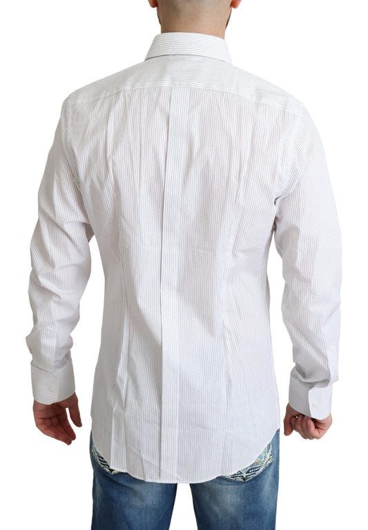 A white cotton dress shirt with vertical stripes, featuring a collar and long sleeves