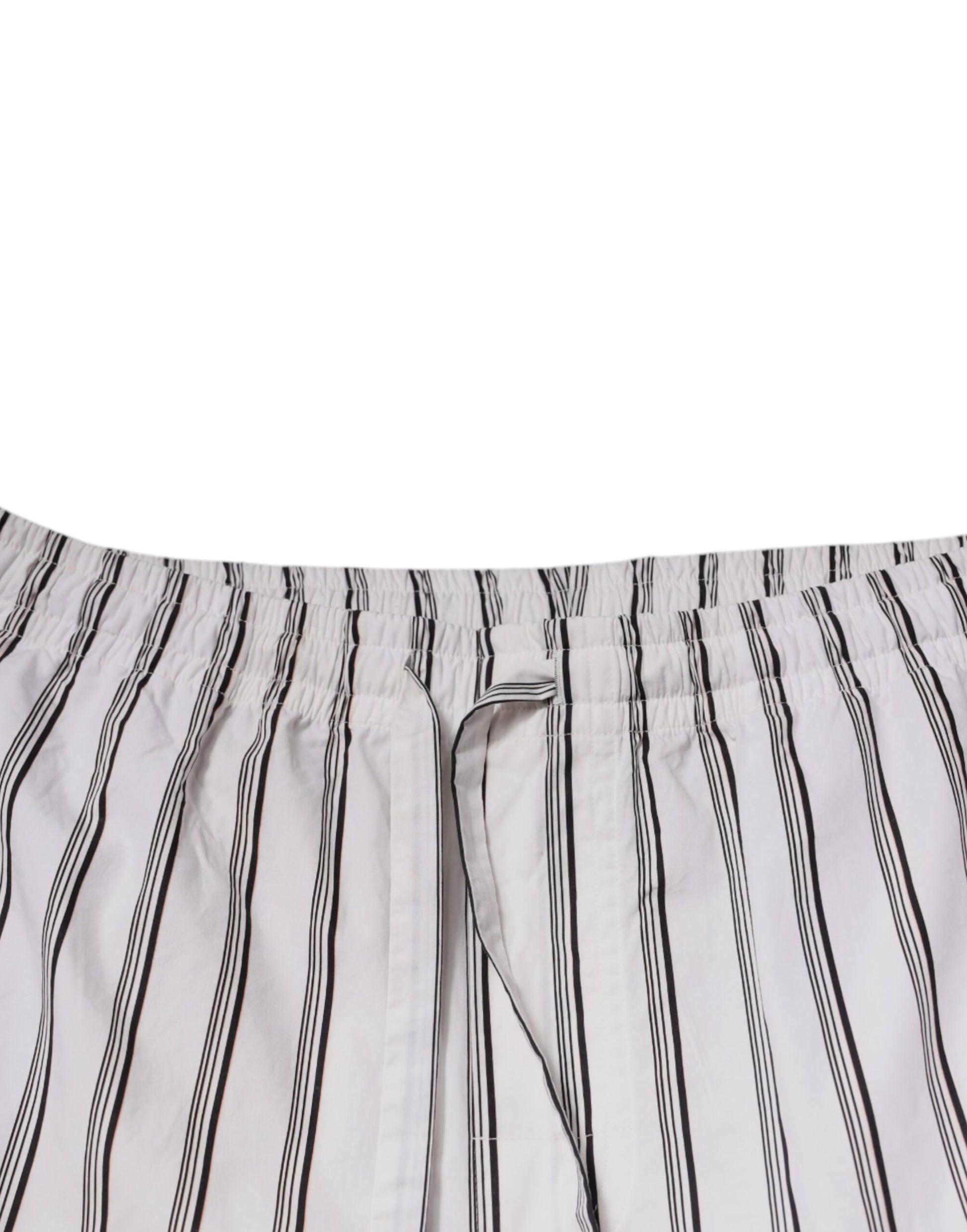 A pair of white striped cotton skinny dress pants by Dolce & Gabbana