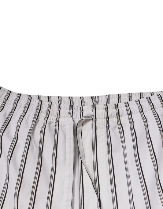 A pair of white striped cotton skinny dress pants by Dolce & Gabbana