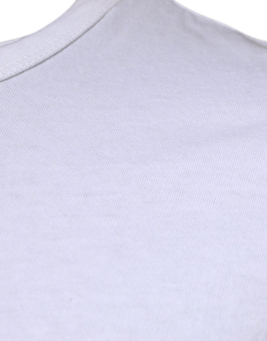 White t-shirt hanging on a hanger