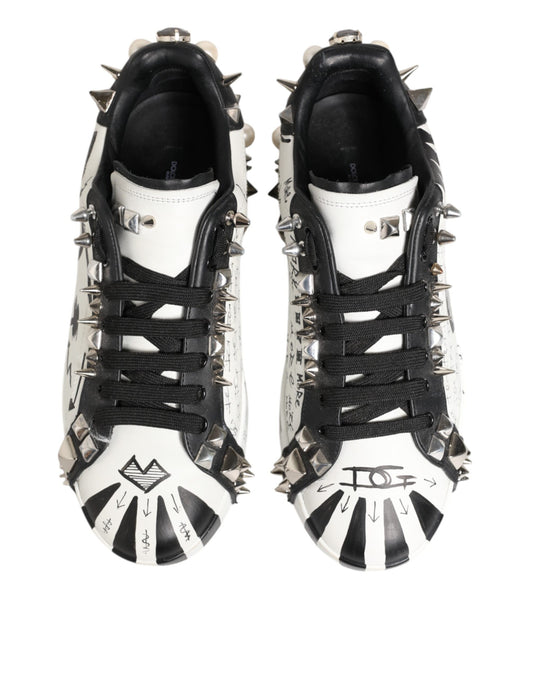 Pair of black and white studded sneakers with printed design