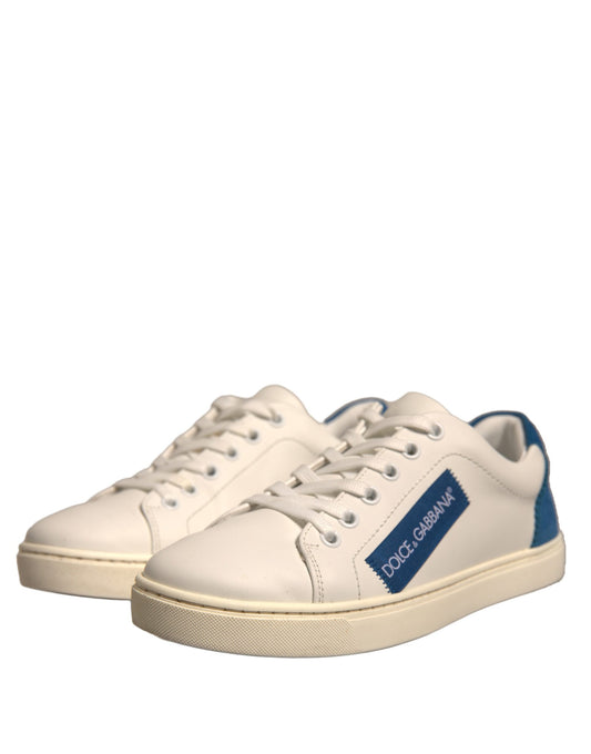 Pair of white sneakers with blue accents