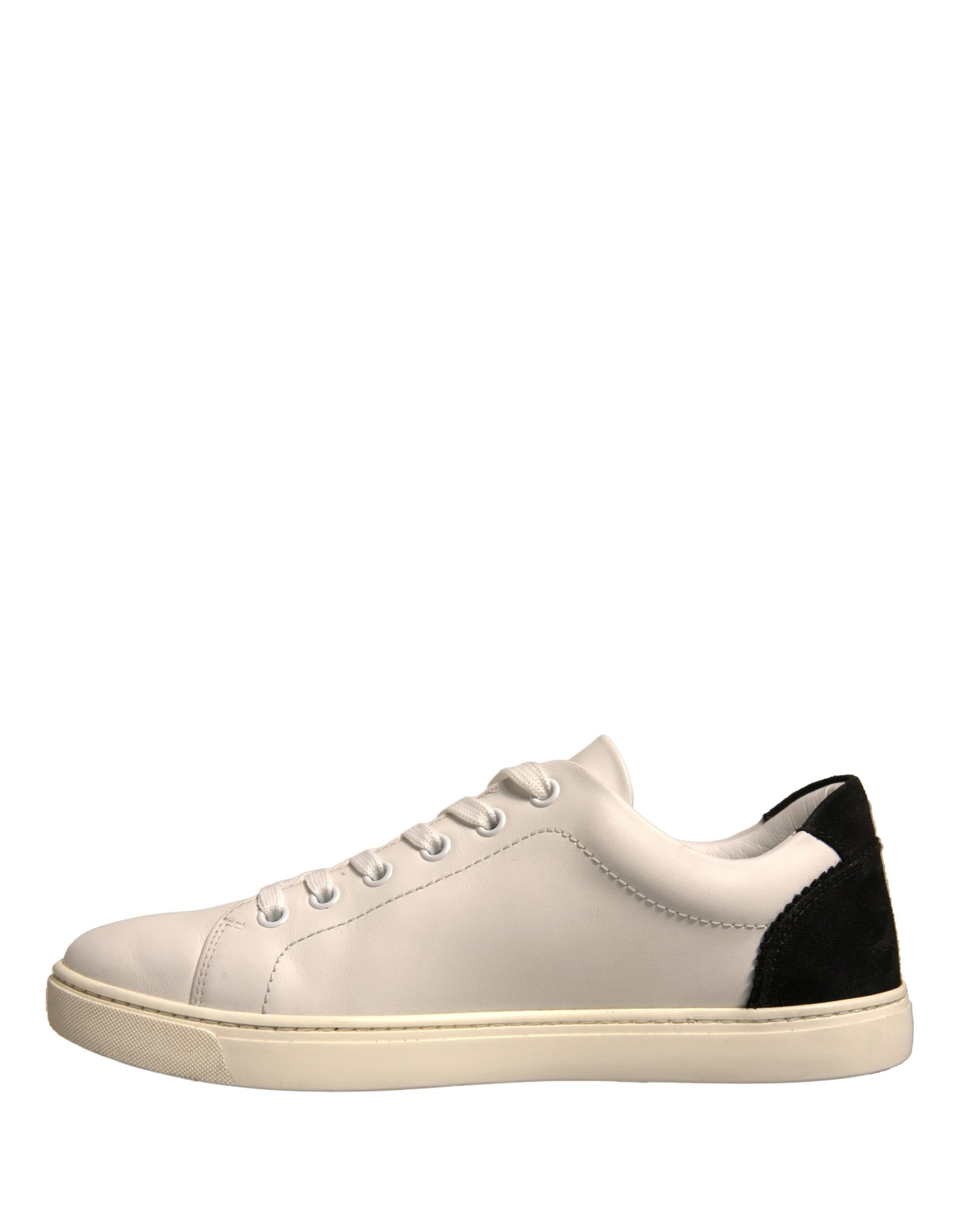 White sneaker with black stripes on sides