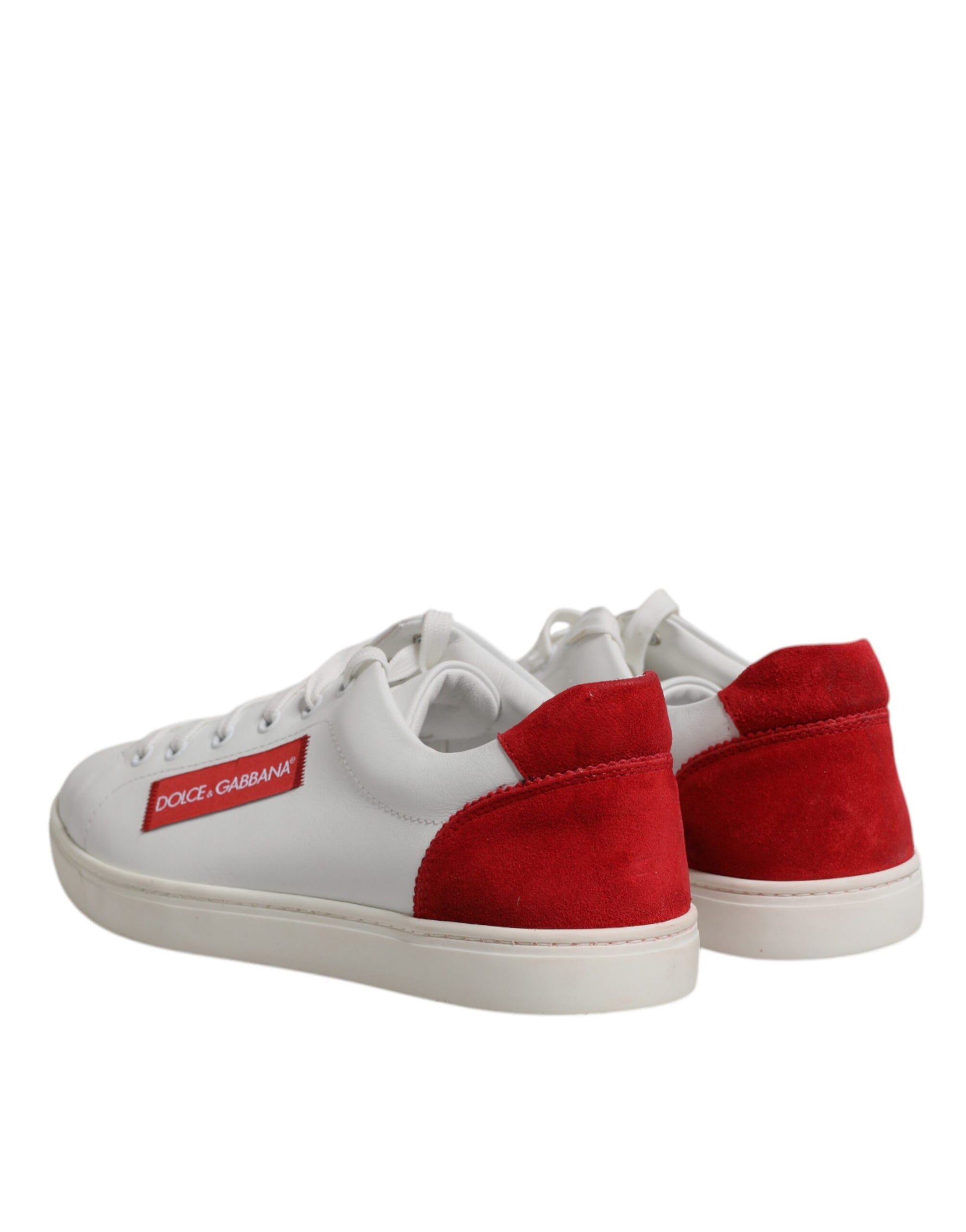 Pair of red and white sneakers with laces