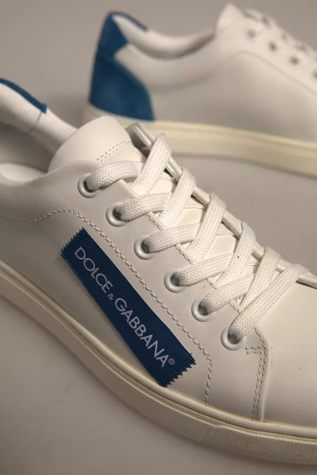 White sneaker with blue laces and logo on side