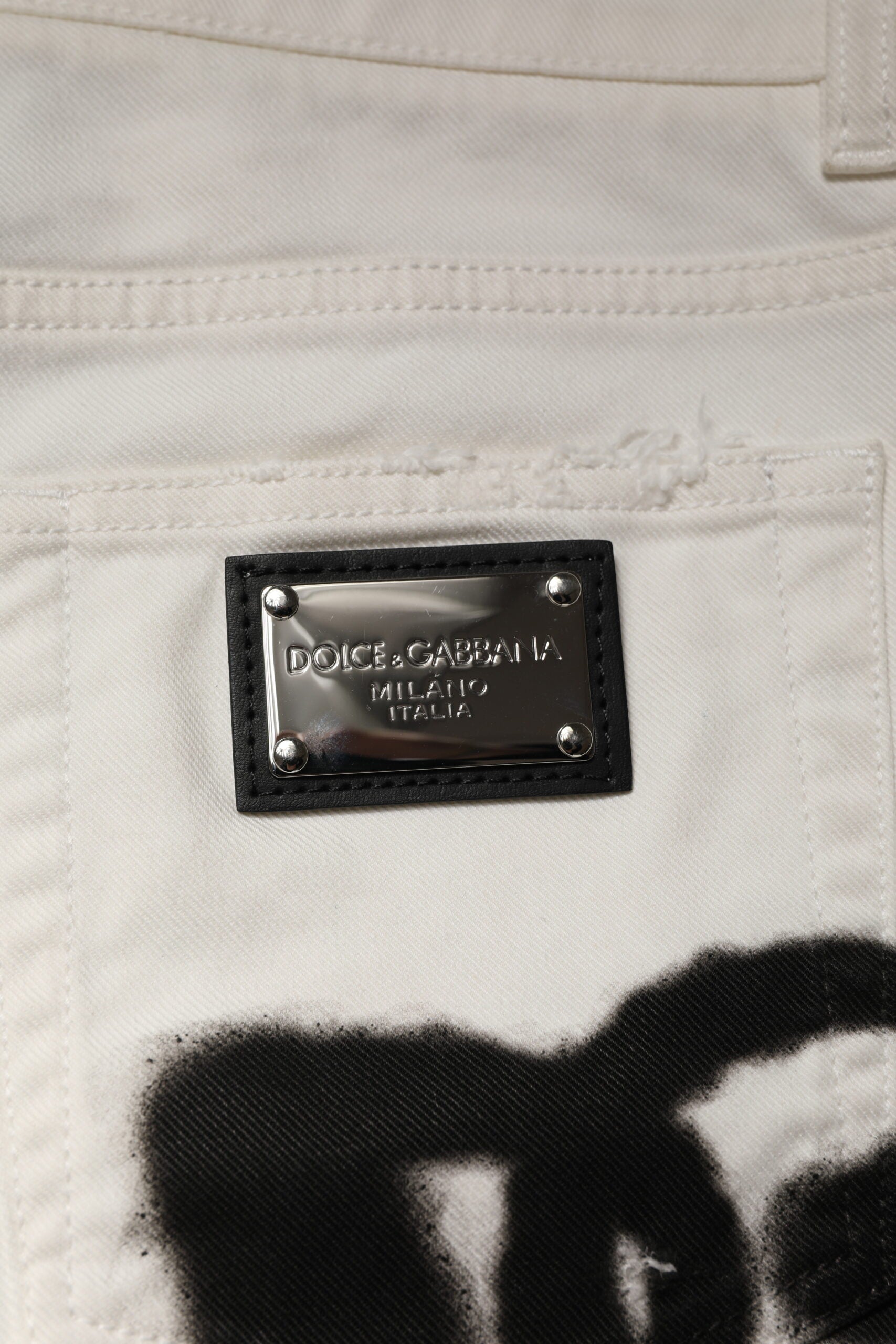Black label on white fabric