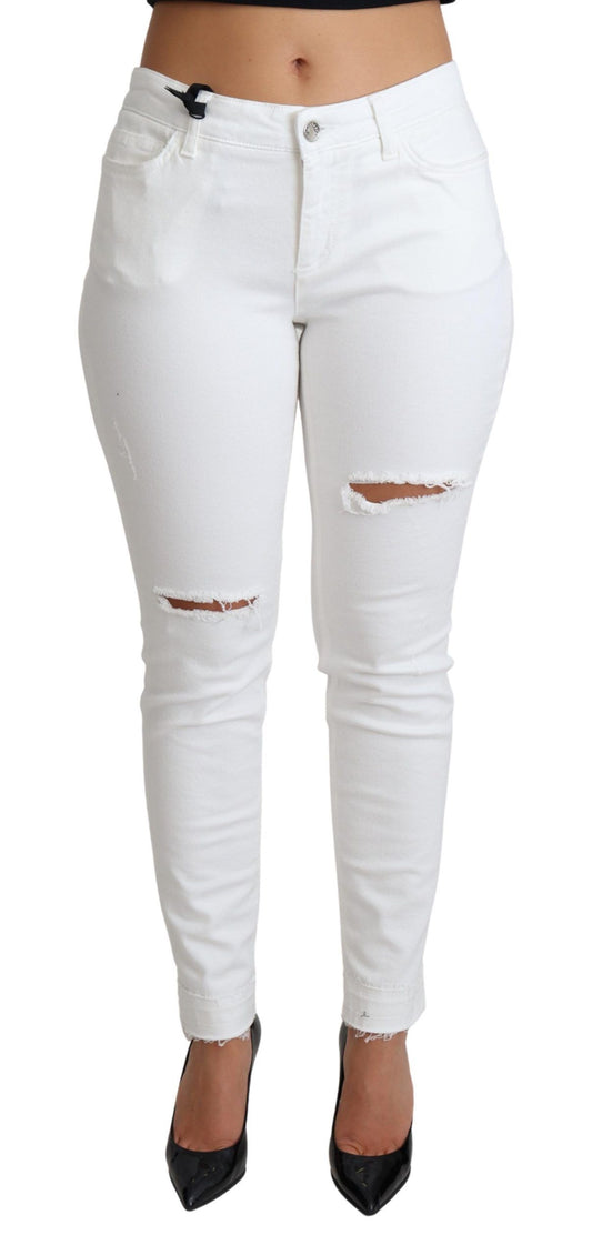 White skinny jeans with distressed knees