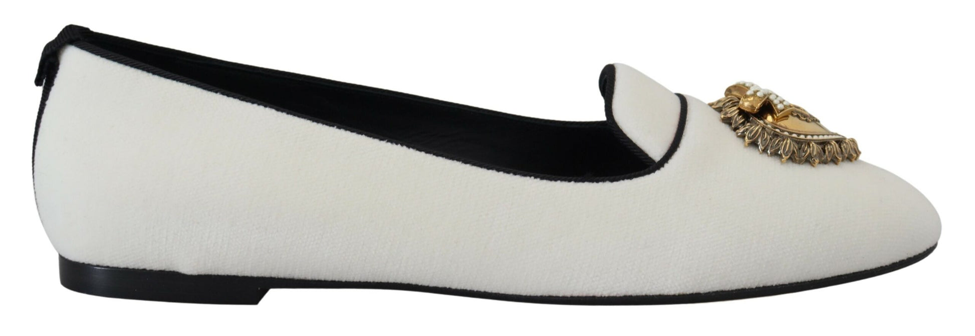 Black and white shoe with a gold buckle