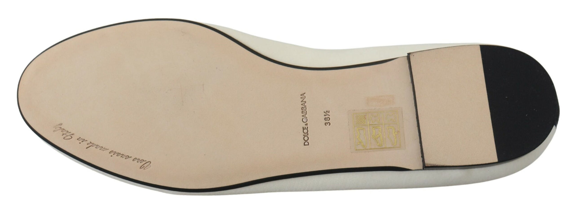 Pair of brown shoes with black and white laces