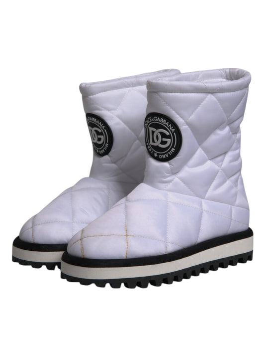White snow boots with black trim and soles